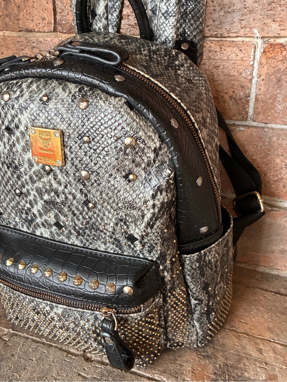 🏴☠️ MCM Stark Python Print backpack Ltd Edition black python and gray w studs - Picture 4 of 17